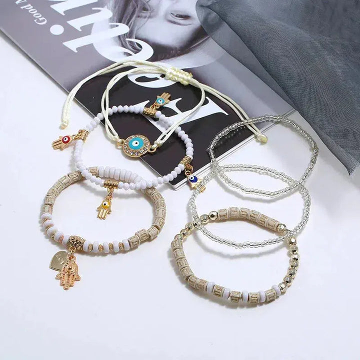 Комплект гривни Hamsa